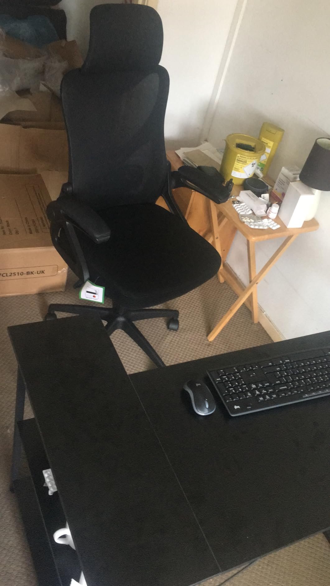 Customer photo of the chair beside a desk